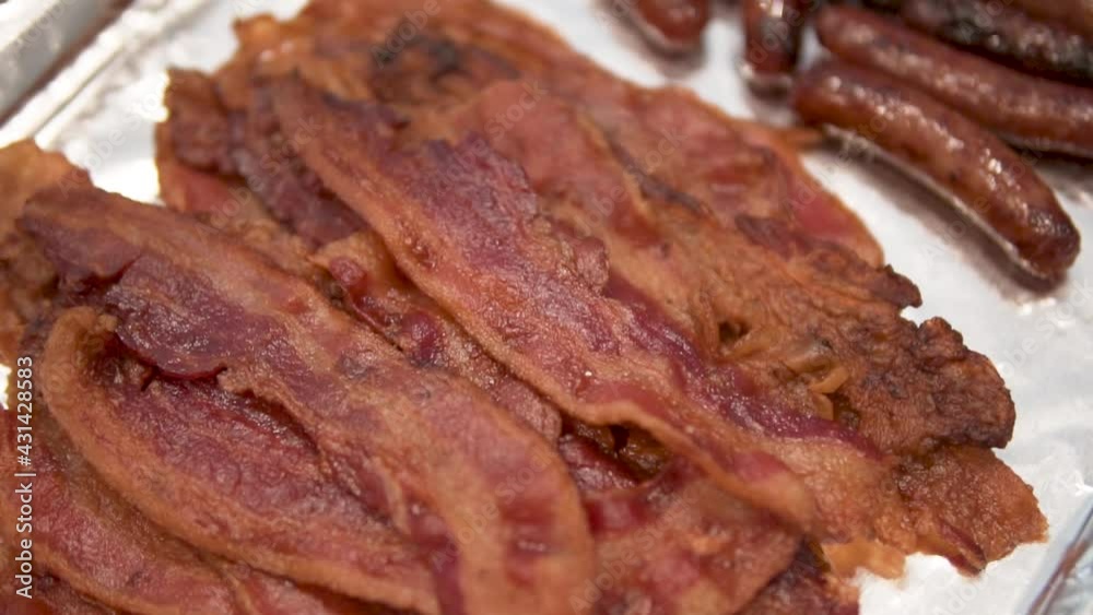 Bacon slices and breakfast sausages, CLOSE UP Bacon slices and breakfast sausages, CLOSE UP