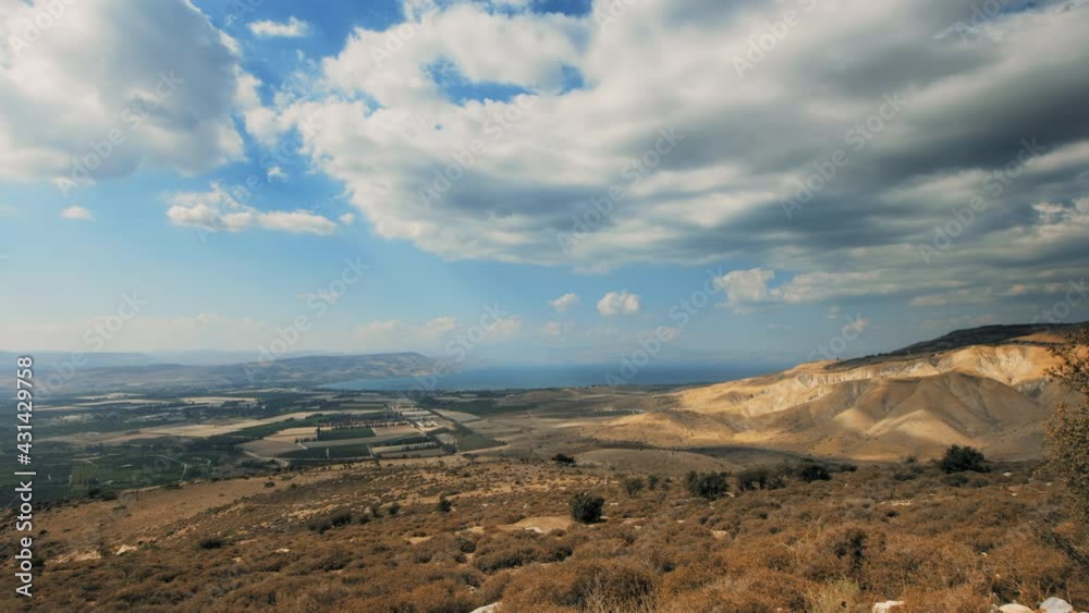 Sea of Galilee, Kinneret. Kinnereth. Lake of Gennesaret. Lake Tiberias. Golan Heights. Awesome landscape, wide shot dolly right for Sea of Galilee with Golan Heights and Agriculture Farms. 4k footage Sea of Galilee, Kinneret. Kinnereth. Lake of Gennesaret. Lake Tiberias. Golan Heights. Awesome landscape, wide shot dolly right for Sea of Galilee with Golan Heights and Agriculture Farms. 4k footage