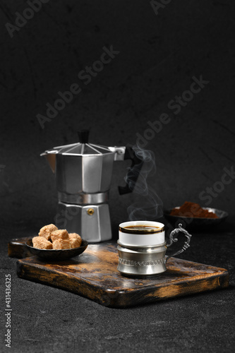 Espresso coffee, broun sugar and geyser coffee maker