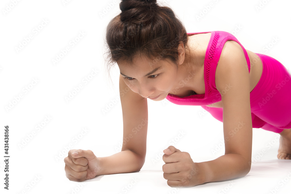 Strong woman doing pushup,concept of healthy life and natural balance between body and mental development Strong woman doing pushup,concept of healthy life and natural balance between body and mental development
