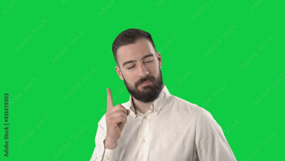 Smart young business man having solution or idea concept. Portrait on green screen background. Smart young business man having solution or idea concept. Portrait on green screen background.