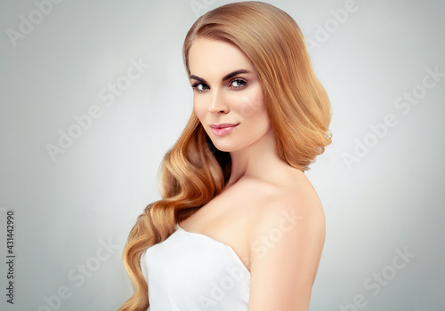 Beautiful woman with long blonde hairstyle healthy beauty skin natural make up