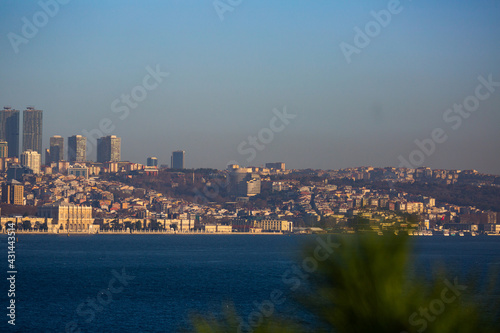 Scenic view of modern cityscape of Beyoglu district in Istanbul from Topkapi across Bosphorus and Golden Horn bay on sunny winter day, Turkey.