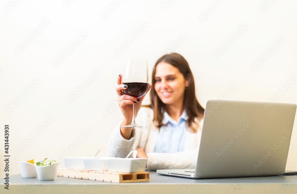 person drinking wine sitting in her apartment person drinking wine sitting in her apartment