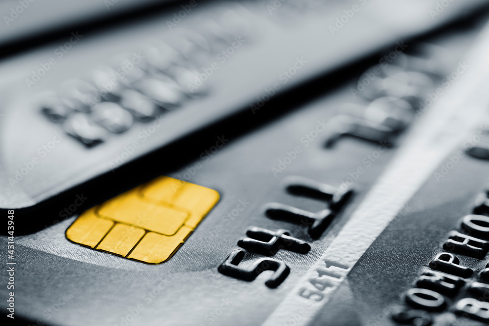 Stack credit cards, close up view with selective focus for background. Online credit card payment. Stack credit cards, close up view with selective focus for background. Online credit card payment.