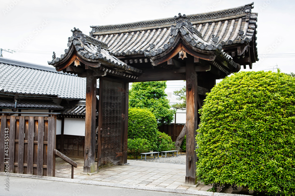 Fushimi Inari Taisha Shrine in Kyoto, Japan with beautiful red gate and japanese garden. Red Torii gates in Fushimi Inari shrine in Kyoto, Japan.