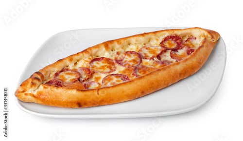 Turkish boat-shaped flatbread pide isolated on white