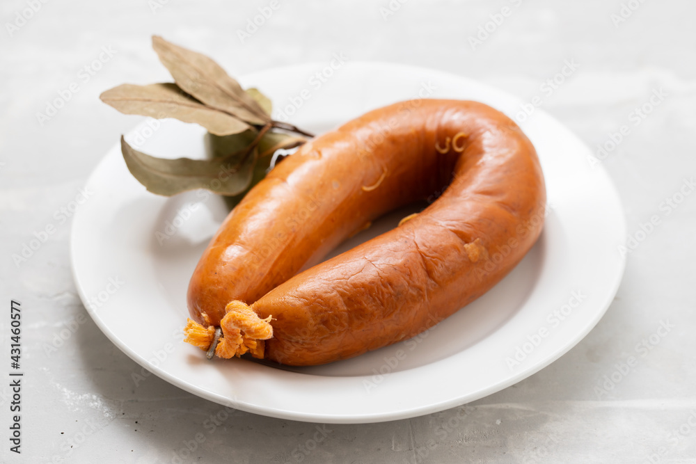 typical portuguese smoked sausage Farinheira on the dish typical portuguese smoked sausage Farinheira on the dish