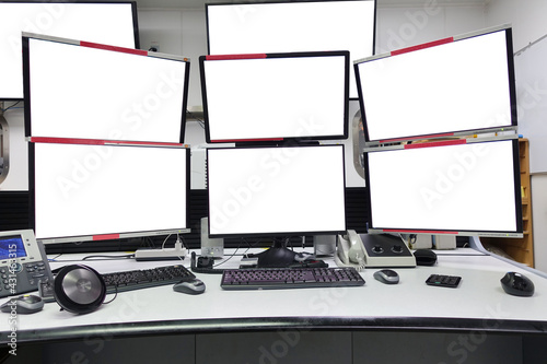 group of blank monitors and screen on security desk or control room for monitor process or stock data trading.
