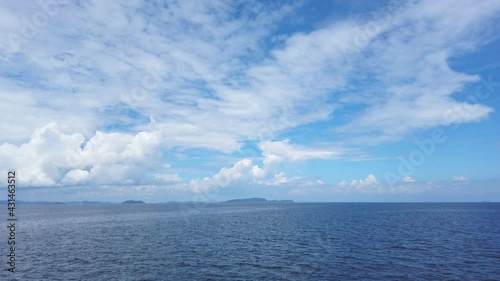 Wallpaper Mural 4K point of view from moving boat travels across the calm blue sea with beautiful blue sky with white cloud. Torontodigital.ca