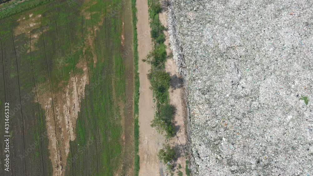aerial view from flying drone of garbage pile
aerial view from flying drone of garbage pile