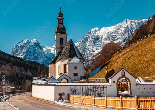Beautiful winter landscape with the famous church Saint Sebastian and the Reiteralpe summit in the background at Ramsau, Berchtesgaden, Bavaria, Germany