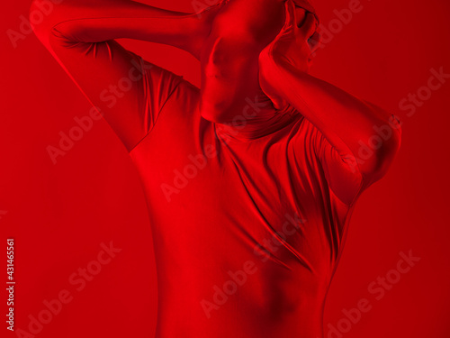 crazy screaming red man on a red background. figure in a leotard
