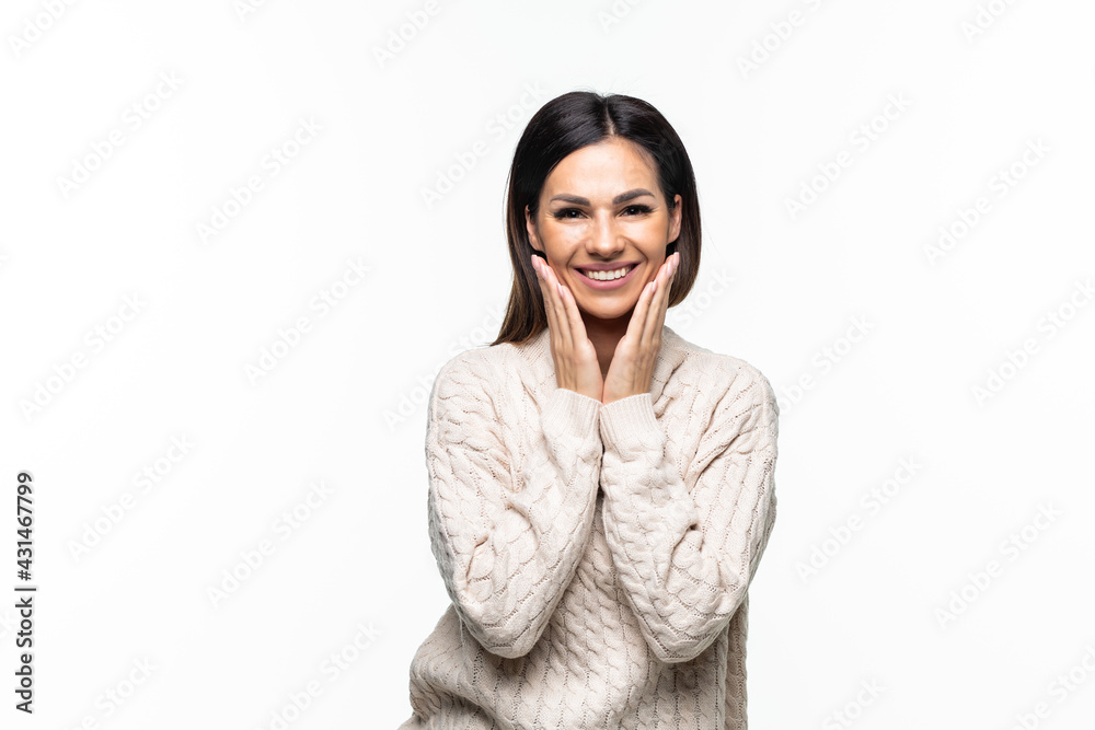 Young woman touching her face isolated on white background Young woman touching her face isolated on white background