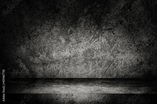 Empty space of Studio dark room of Plaster concrete grunge texture background for use display product.