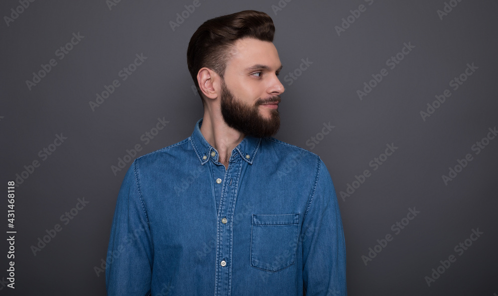 Photo of side view close up portrait of the handsome stylish bearded hipster man after barber shop or salon Photo of side view close up portrait of the handsome stylish bearded hipster man after barber shop or salon
