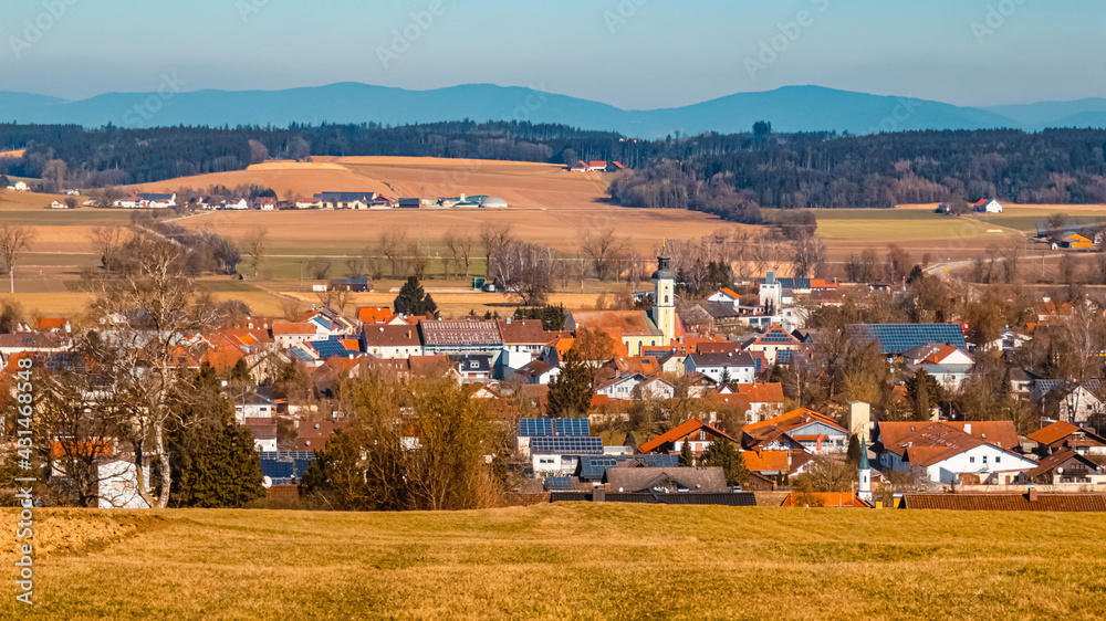 Beautiful sunny winter view with the Bavarian forest in the background near Eichendorf, Bavaria, Germany