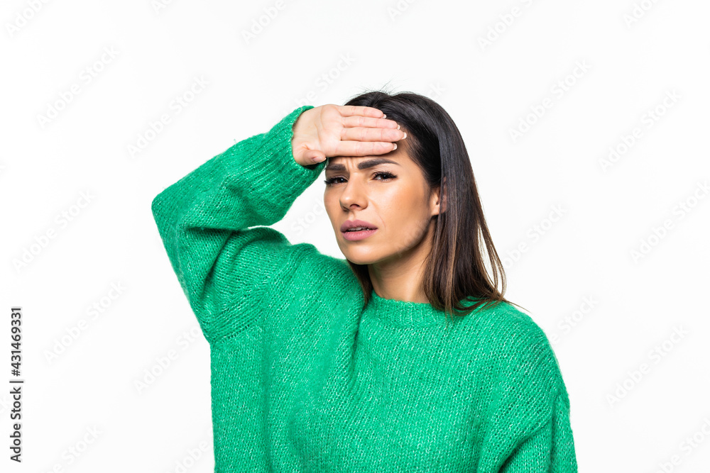 A young woman with a headache holding head, isolated on white background A young woman with a headache holding head, isolated on white background