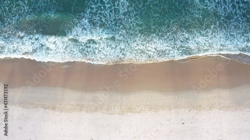 4K Aerial drone top view crowd of people at tropical Beach with sunset in Phuket, Thailand, Beautiful Phuket beach is famous tourist destination at Andaman sea. Top view happy people play on the beach