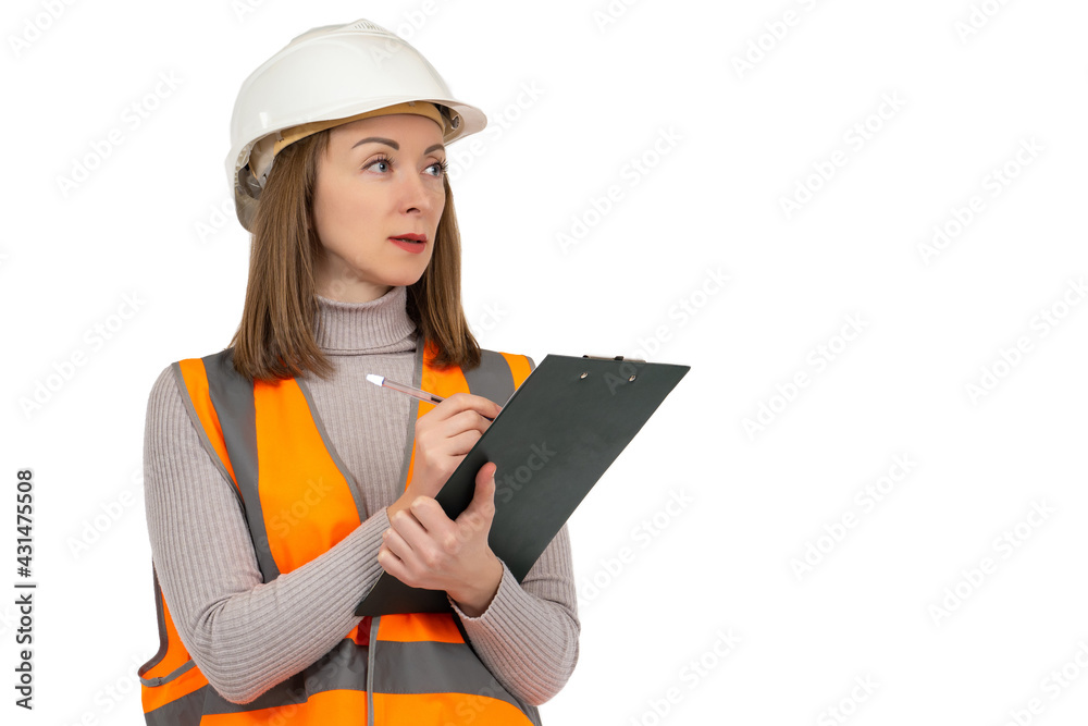 Girl in a white helmet and a reflective vest. Woman is holding a paper tablet and a pen. A girl in a reflective vest writes down information. A woman in a hard hat is isolated on a white background. Girl in a white helmet and a reflective vest. Woman is holding a paper tablet and a pen. A girl in a reflective vest writes down information. A woman in a hard hat is isolated on a white background.