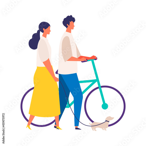 Young couple dating in summer. Stylish man and woman walking around the street.