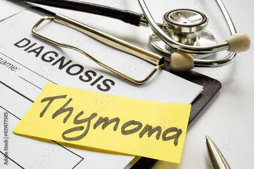 Diagnosis form and thymoma sign and stethoscope. photo