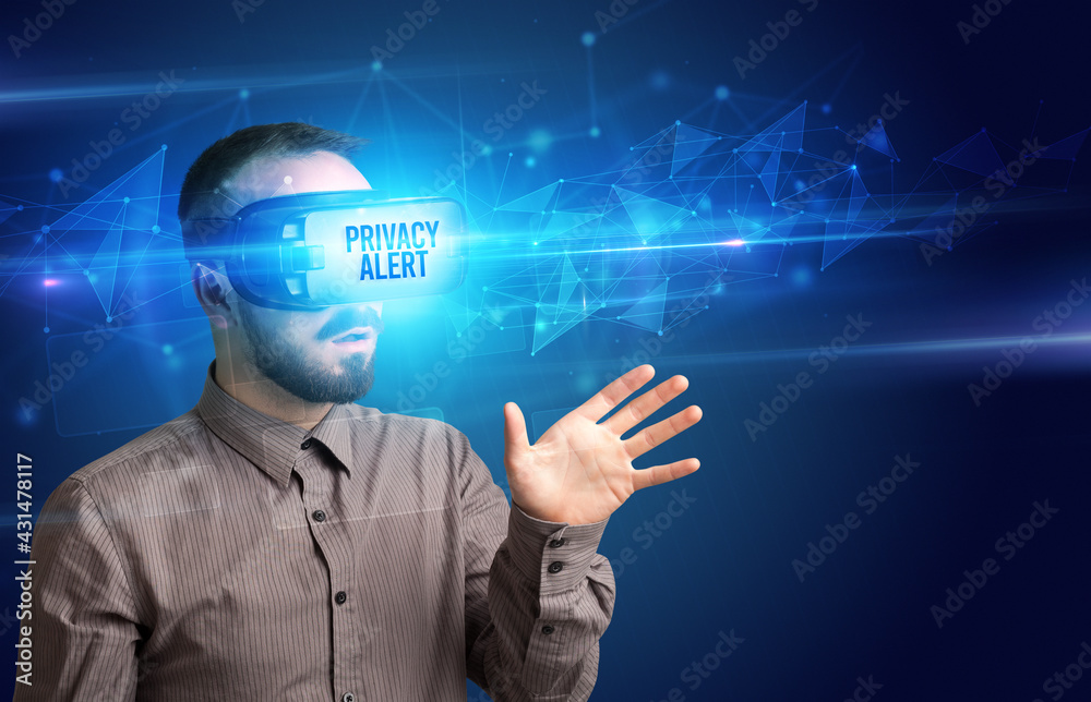 Businessman looking through Virtual Reality glasses, virtual security concept Businessman looking through Virtual Reality glasses, virtual security concept