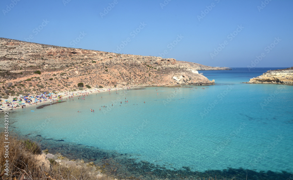 Obraz premium Transparent and blue water in the sea of Lampedusa at the Rabbits beach. The Pelagie Islands are the southernmost point of Italy in Sicily.
