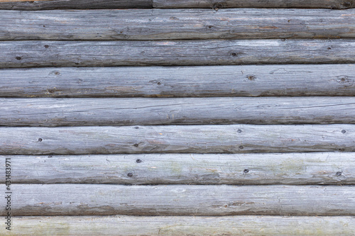 Texture, structure or pattern of old wood or timber surface of house, hut or cottage of beams, logs, trunks or planks laying horizontally