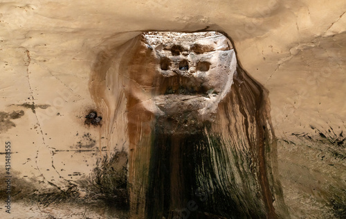 Economic  cave - columbarium - a dovecote near the excavations of the ancient Maresha city in Beit Guvrin, near Kiryat Gat, in Israel photo