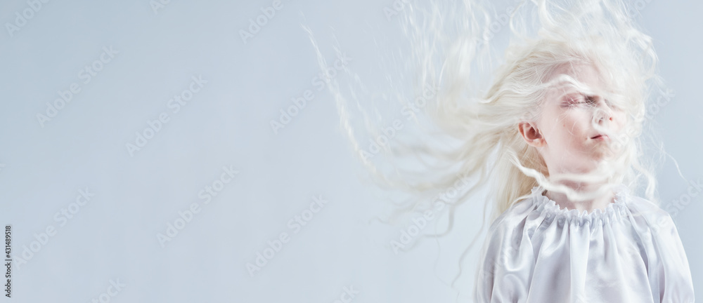 Albino girl on a white background. Widescreen photo Albino girl on a white background. Widescreen photo