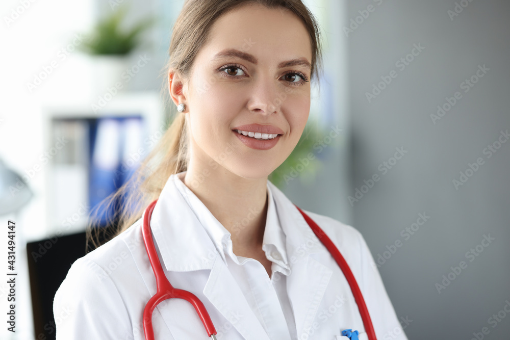 Portrait of beautiful young woman medic in clinic Portrait of beautiful young woman medic in clinic