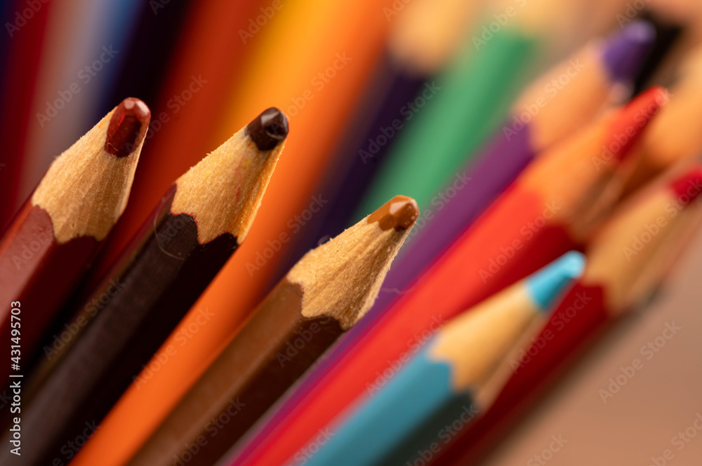 Obraz premium Colorful pencils in a glass. Self-isolation in the covid-19 pandemic.
