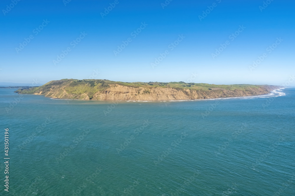 South Head of Manukau harbour entrance from Whatipu beach, Auckland, New Zealand