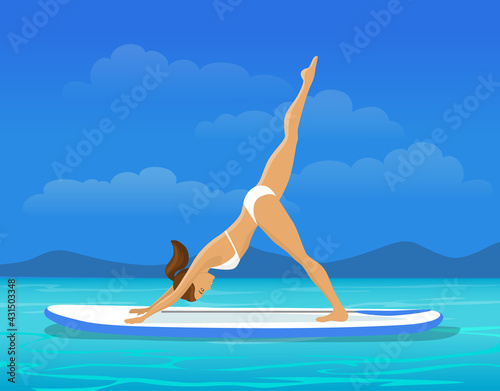 Woman doing stand up paddling yoga workout on paddle board on water