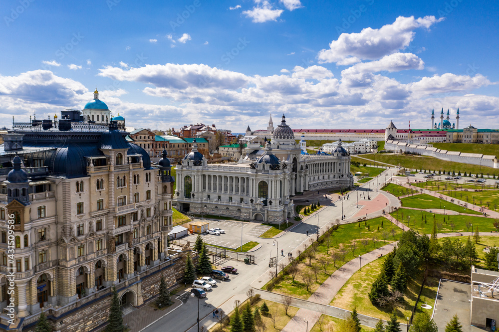 a panoramic view of a large ancient Kremlin-fortress on a sunny day in the old part of Kazan filmed from a drone 