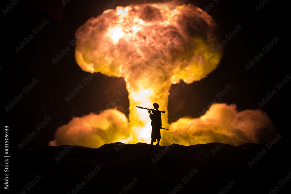 Military soldier silhouette with bazooka. War Concept. Military silhouettes fighting scene on war fog sky background, Soldier Silhouette aiming to the target at night.