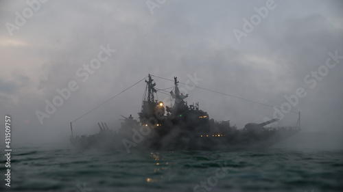 Foto Silhouettes of a crowd standing at blurred military war ship on foggy background