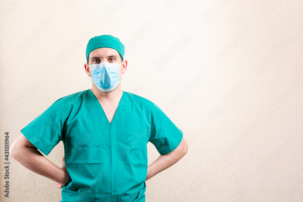A proud doctor in a cap and a mask. A proud doctor in a cap and a mask.