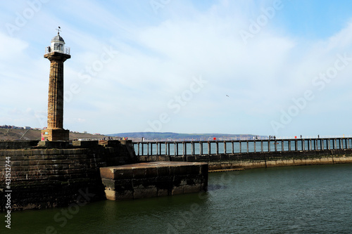 Whitby Lighthouse and Pier © eric