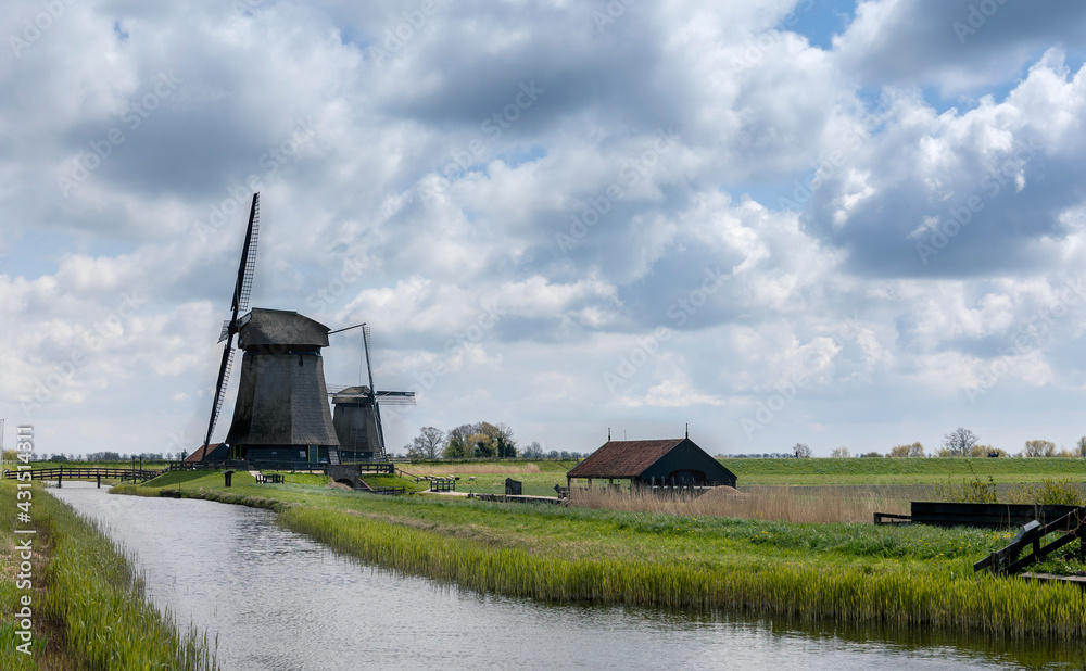 Windmill in polder Schermerhorn in the Netherlands
