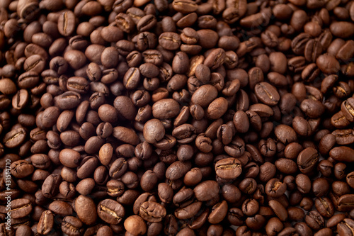 Texture of coffee beans. Coffee beans background. Roasted coffee full frame