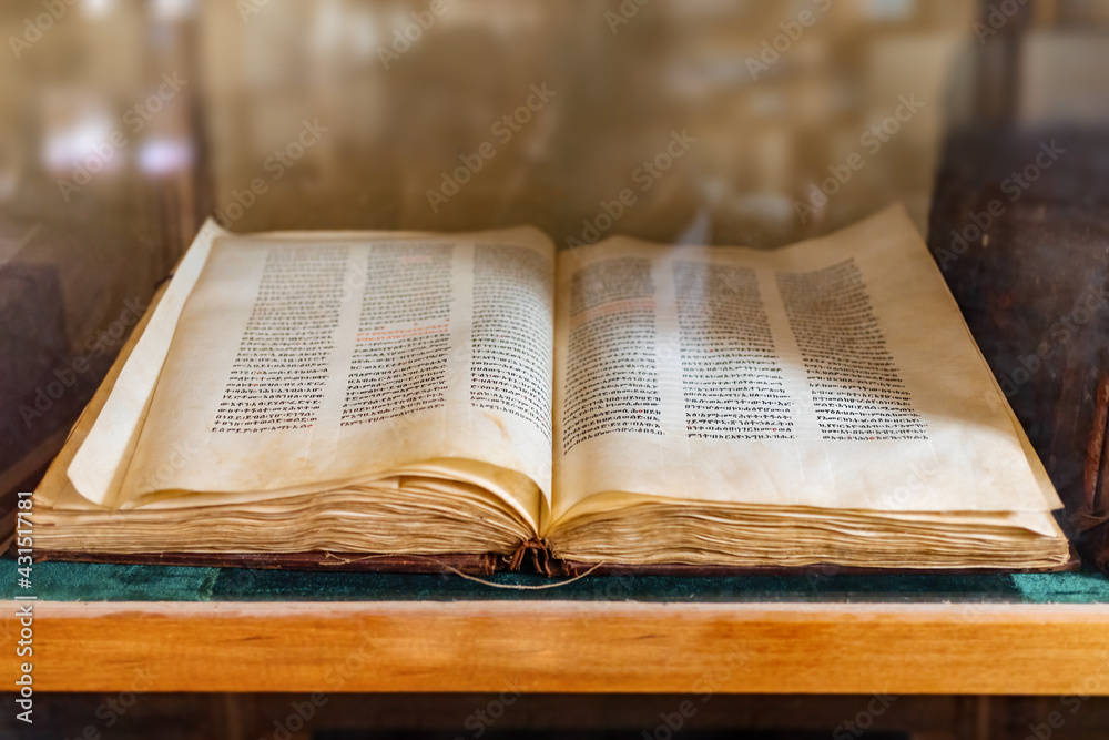 very old and Ancient holy Bible in Amharic language in the UNESCO monastery Ura Kidane Mehret, Zeghe peninsula, near Bahir Dar, Amhara Region, Ethiopia. very old and Ancient holy Bible in Amharic language in the UNESCO monastery Ura Kidane Mehret, Zeghe peninsula, near Bahir Dar, Amhara Region, Ethiopia.