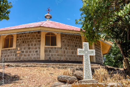 religious christian cross behind Entos Eyesu UNESCO Monastery situated on small island on lake Tana near Bahir Dar. Ethiopia Africa photo