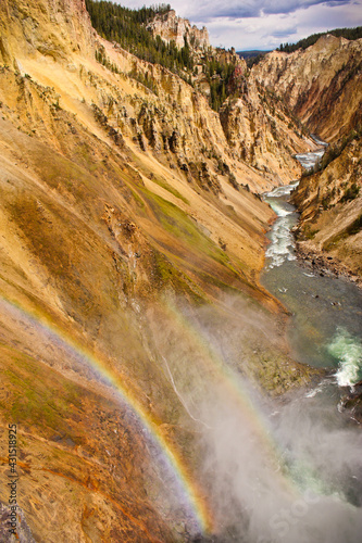 Rainbow over the Yellowstone river in beautiful national park in Wyoming, US