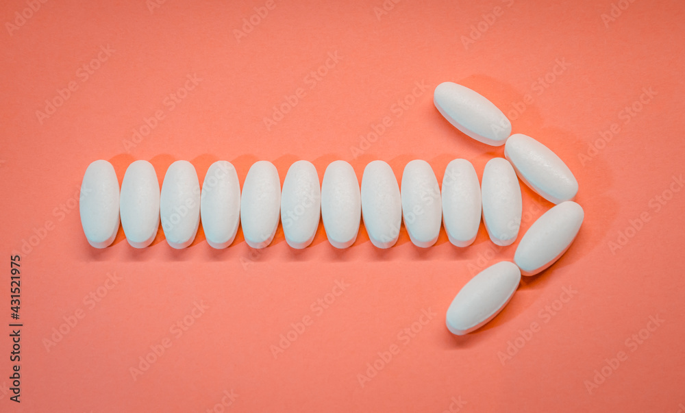 Pointer of pharmacy isolated on a pink background. Medical pills. Medicine and healthy. Pointer of pharmacy isolated on a pink background. Medical pills. Medicine and healthy.
