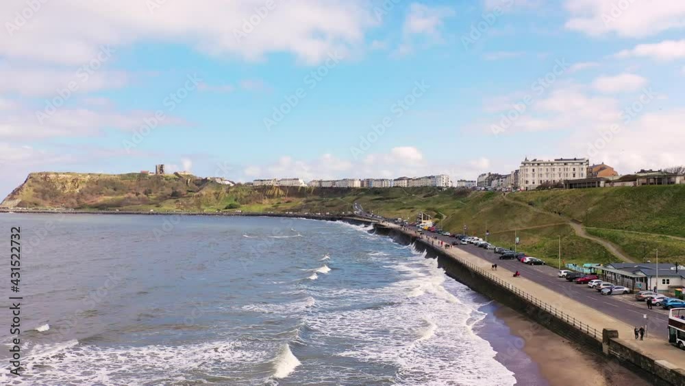 Scarborough North Beach, England, Drone Descending Over Crashing Waves Scarborough North Beach, England, Drone Descending Over Crashing Waves