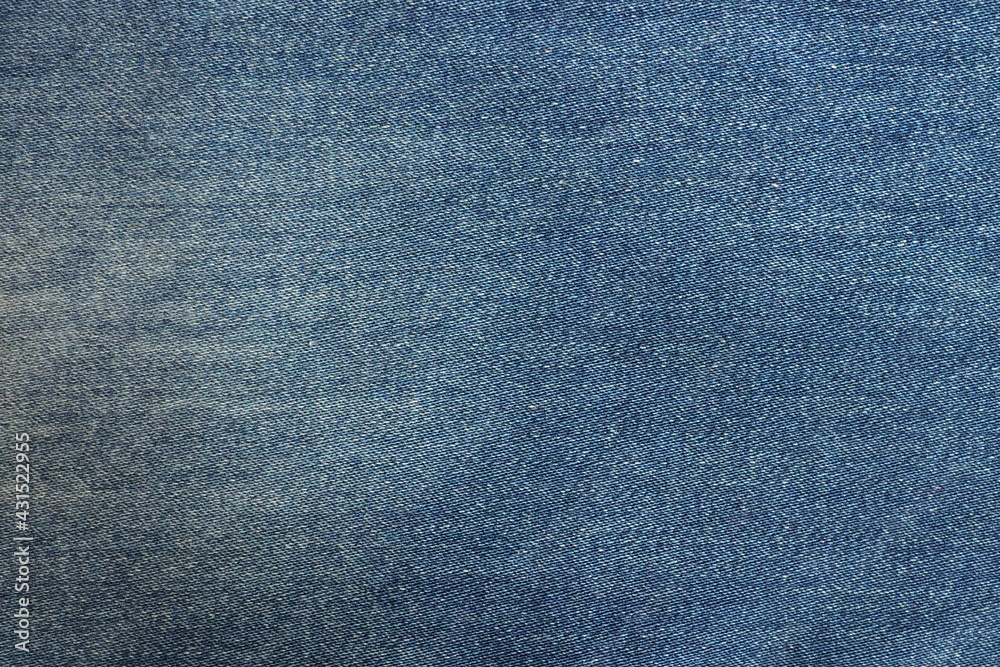 Top view of blue jeans fabric with white stains for background and decoration Textile texture and rough surface of jeans Top view of blue jeans fabric with white stains for background and decoration Textile texture and rough surface of jeans