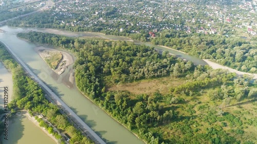 Flight over the river near the settlemen