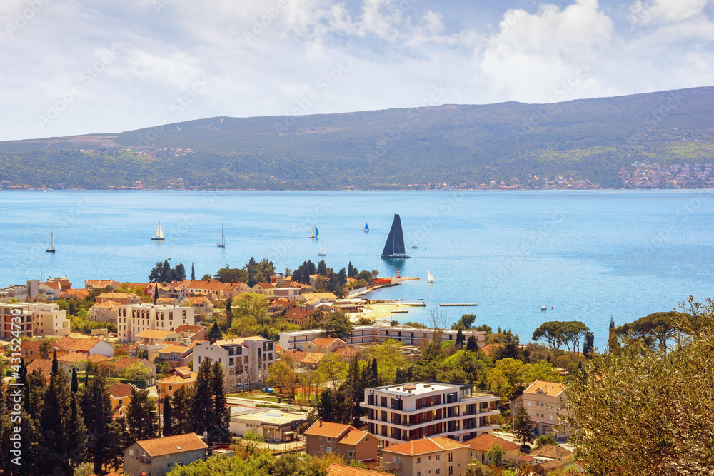 Fototapeta premium Beautiful Mediterranean landscape on sunny spring day. Montenegro, Adriatic Sea, view of Bay of Kotor near Tivat city. Sailboats on water